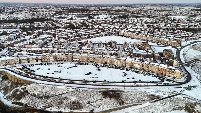 Tynemouth on the north east coast of England saw wintry conditions. Pic: PA