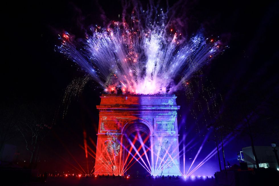 \u200bFireworks explode at the Arc de Triomphe