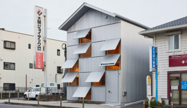 Office with steel-shutter facade