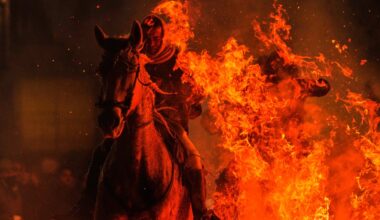 Spaniards celebrate animals with church blessings and bonfire jumping