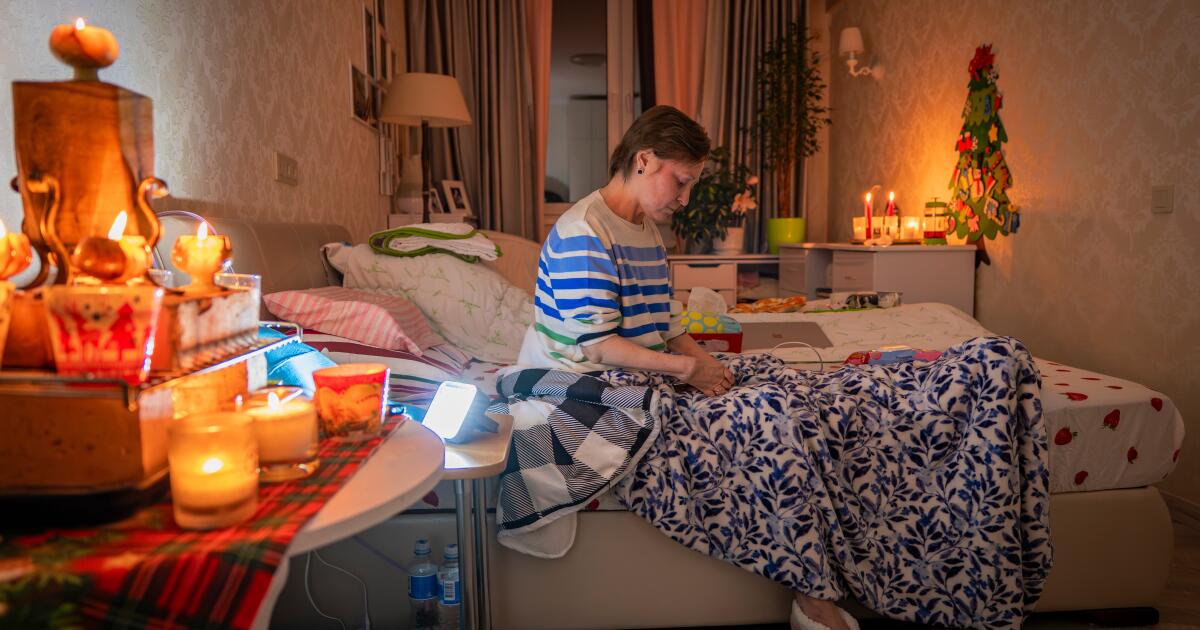 Kyiv residents stranded in cold darkness as Russia hits power system