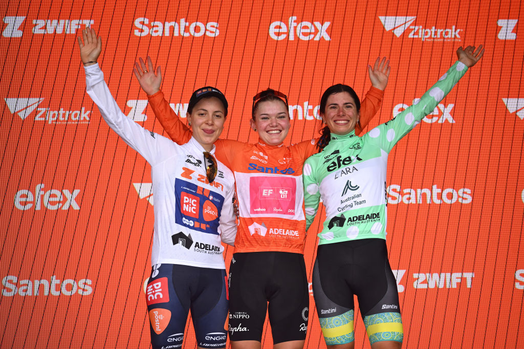 STIRLING, AUSTRALIA - JANUARY 19: (L-R) Eleonora Ciabocco of Italy and Team Picnic PostNL - White Best Young Rider Jersey, Noemi Ruegg of Switzerland and Team EF Education-Oatly - Orange Santos Leader&amp;apos;s Jersey and Alyssa Polites of Australia and ARA Australian Cycling Team - Polka Dot Mountain Jersey celebrate at podium during the 9th Santos Women&amp;apos;s Tour Down Under 2025, Stage 3 a 105.9km stage from Stirling to Stirling 444m / #UCIWWT / on January 19, 2025 in Stirling, Australia. (Photo by Dario Belingheri/Getty Images)