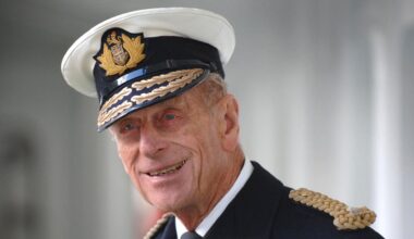 Prince Philip smirks while wearing his military uniform