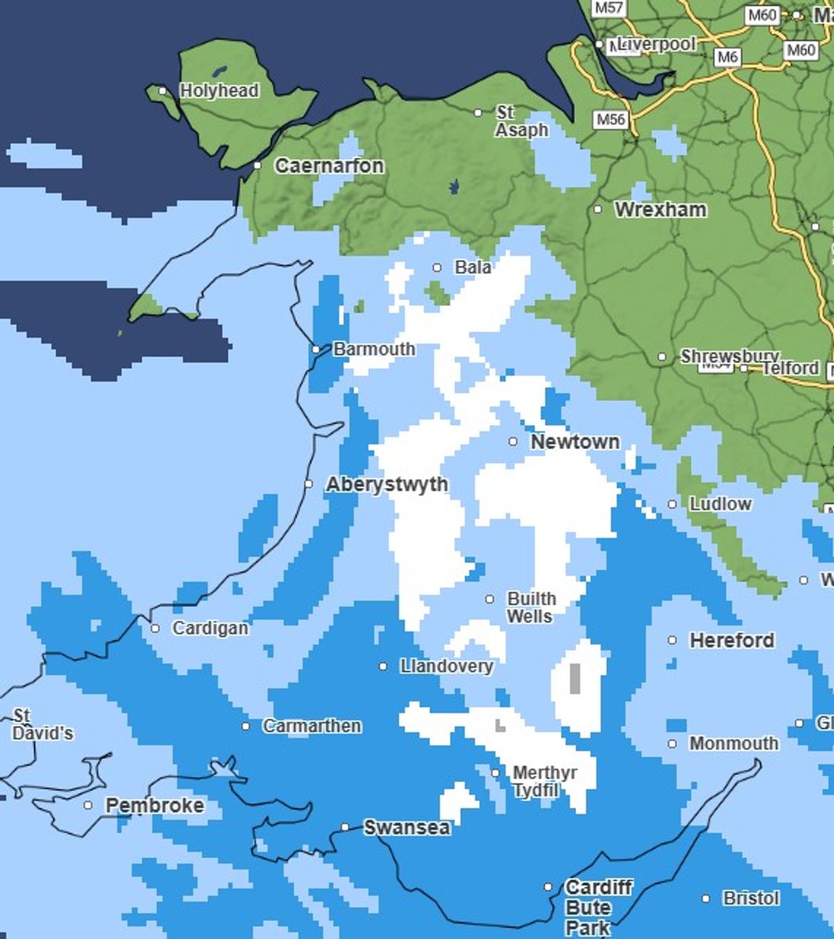 The image shows snowy weather maps