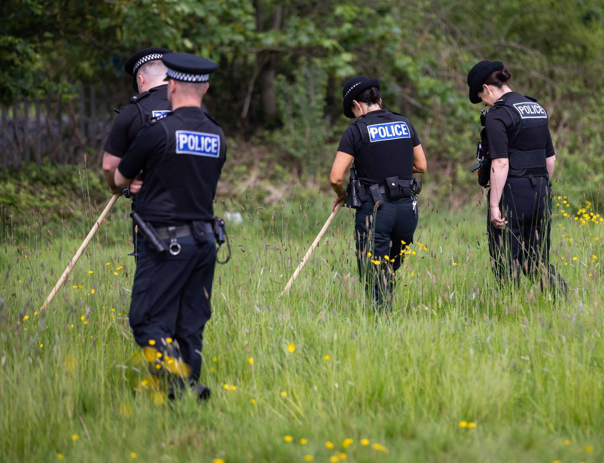 Merseyside Police officers carry out a land search as part of EVOLVE Everton-Vauxhall