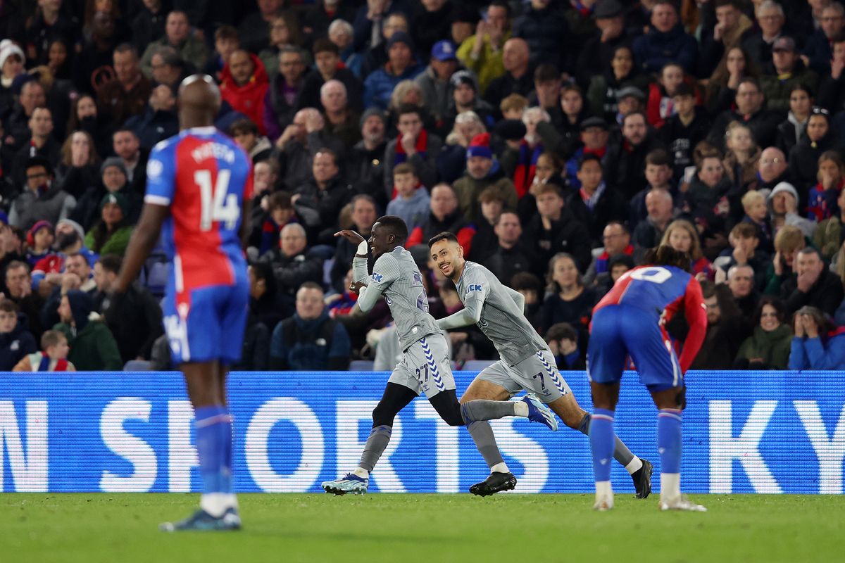 Idrissa Gueye of Everton (L) celebrates with teammate Dwight McNeil after scoring the team's third goal during the Premier League match between Crystal Palace and Everton FC at Selhurst Park on November 11, 2023 in London, England