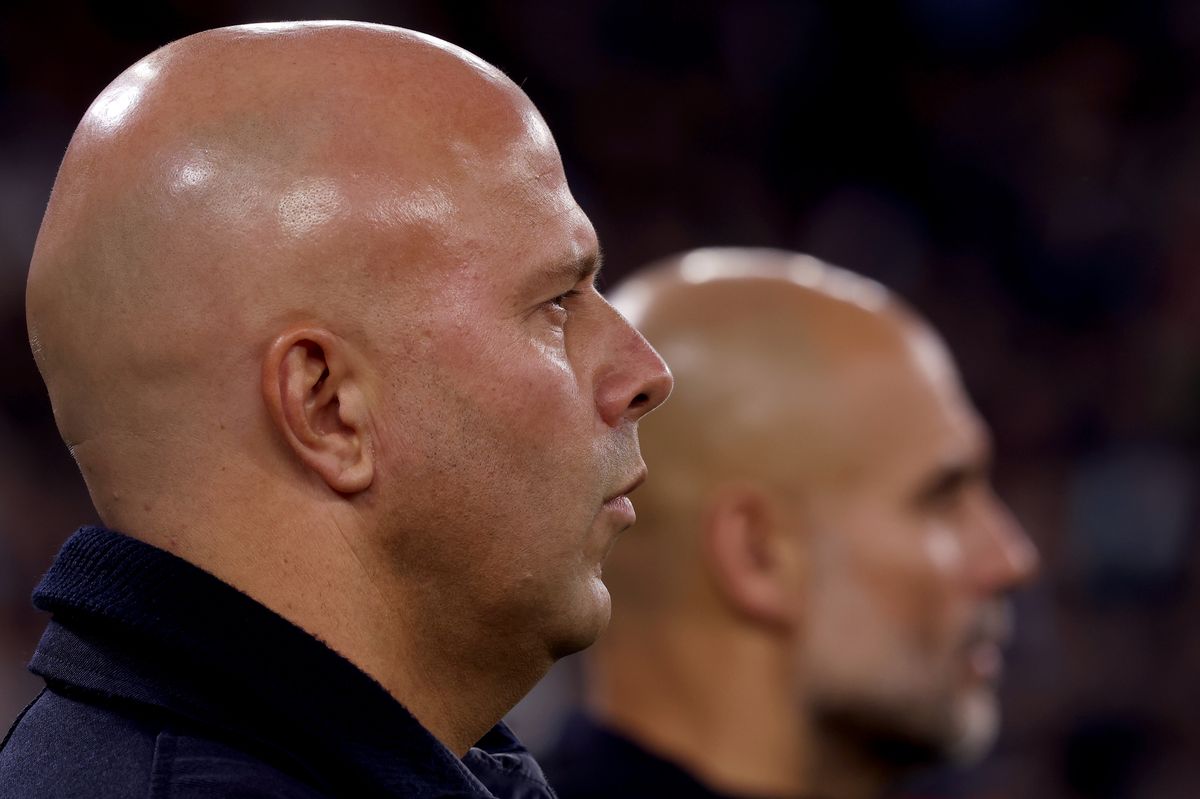 Liverpool boss Arne Slot and Manchester City manager Pep Guardiola