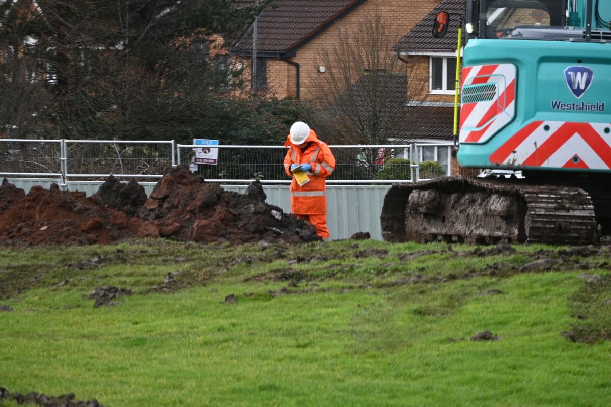 Contractors carrying out work on the development site near to Cherryfield Drive
