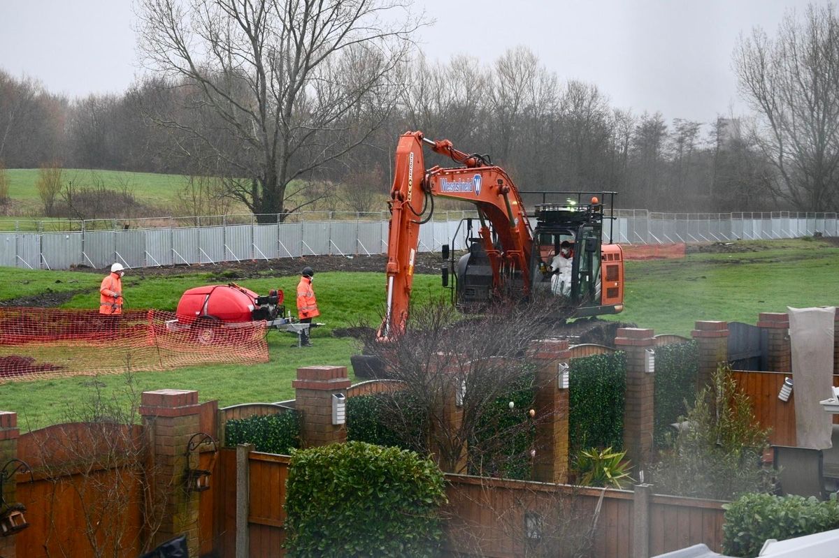 Contractors carrying out work on the development site near to Cherryfield Drive