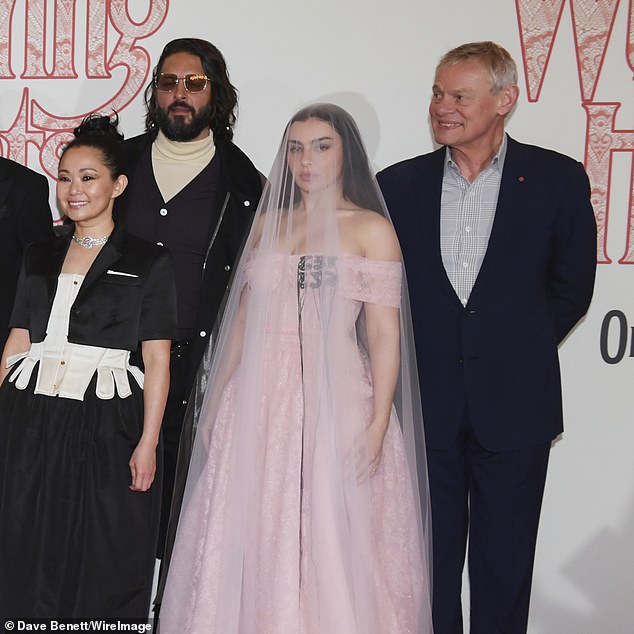 Martin Clunesmade the most of his chance to mingle with the A-Listers as he attended the glitzy UK premiere of his film Wuthering Heights on Thursday