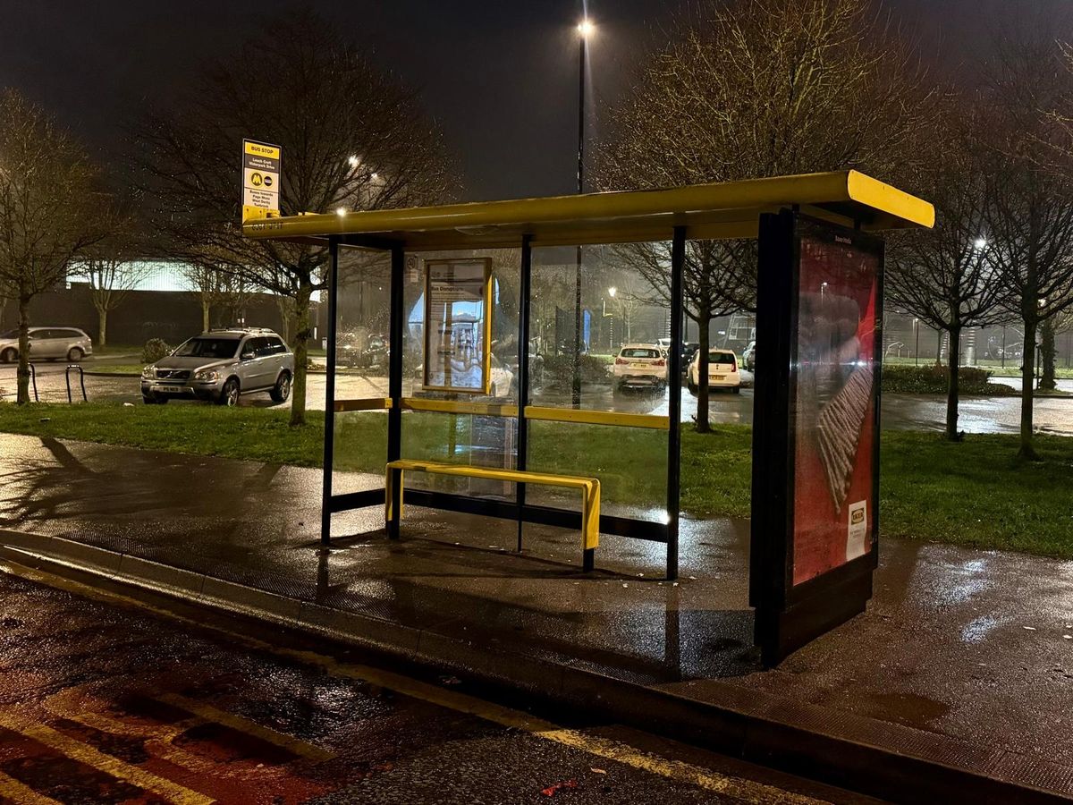 An empty bus stop in Stockbridge Village shopping parade, which services the 12 and 13 routes, after services were suspended in the area earlier this month