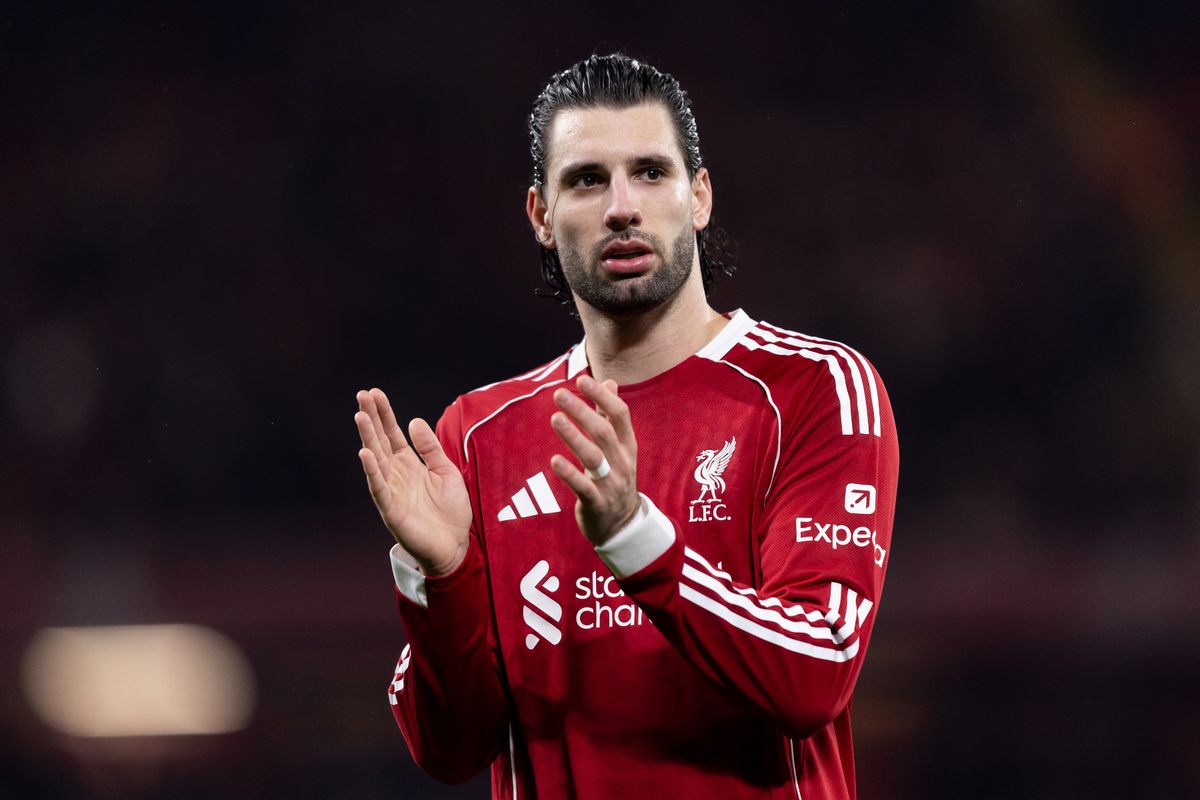 Dominik Szoboszlai claps the fans