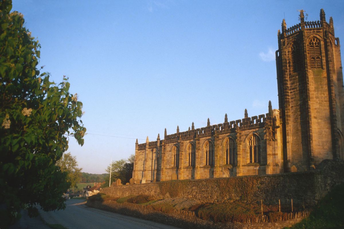 St Michaels Church in the evening sun in the village of Coxwold, Hambleton, North Yorkshire, circa 1985. 