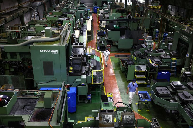 Japan's factory activity growth hits near 3-1/2-year peak, PMI shows