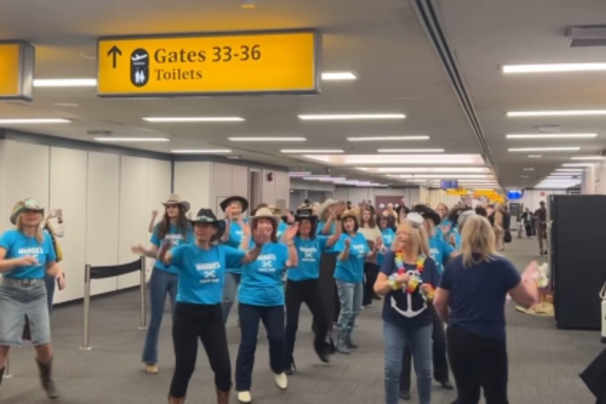 Watch as line dancers surprise passengers with flash mob at Glasgow Airport