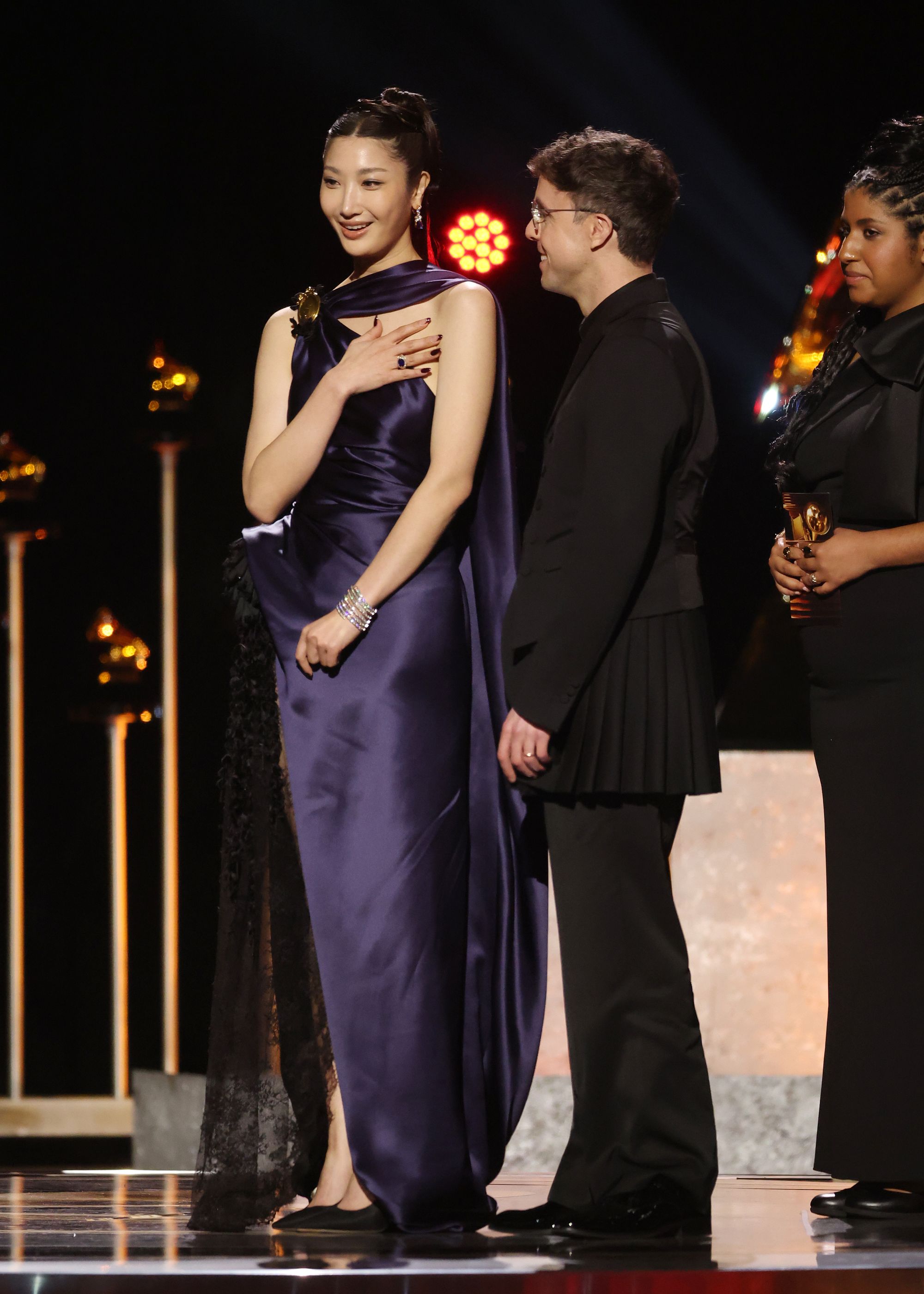 EJAE and Mark Sonnenblick accept the Best Song Written For Visual Media award for ‘Golden’ From ‘KPop Demon Hunters’ onstage during the 68th GRAMMY Awards Premiere Ceremony