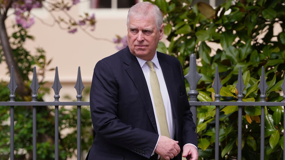 FILE - Prince Andrew looks around as he leaves after attending the Easter Matins Service at...