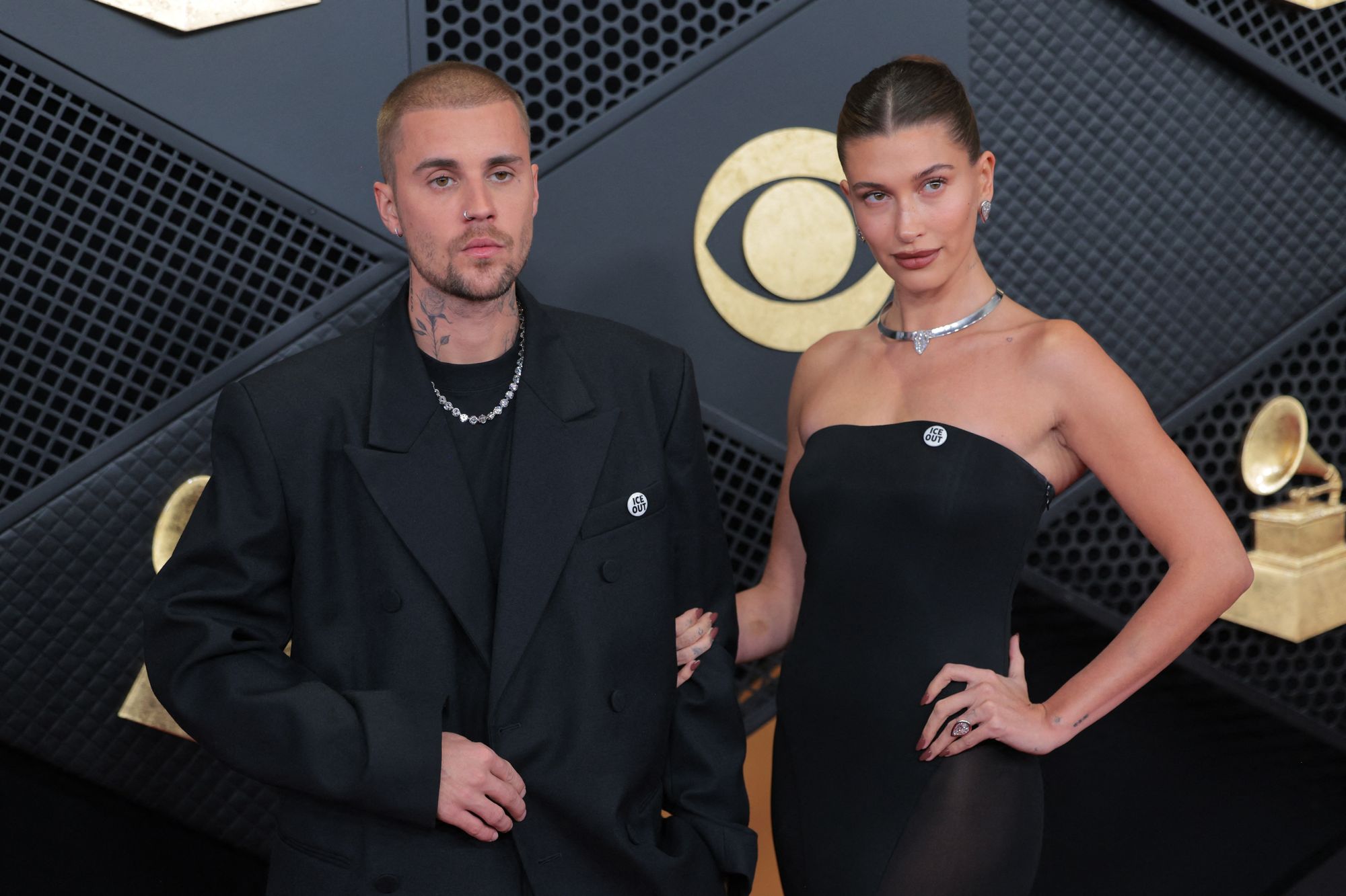 Justin Bieber and Hailey Bieber wore ‘ICE Out’ pins on the 2026 Grammys red carpet
