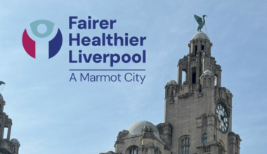 Liver building with the Fairer, Healthier Liverpool logo overlayed