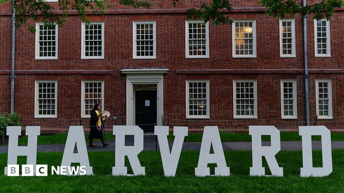 A students walks past a display on the Harvard University campus in Cambridge, Massachusetts.