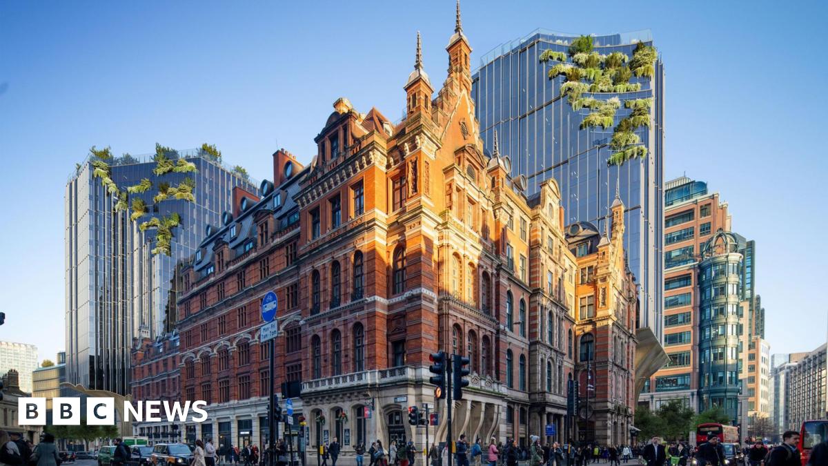 The exterior of Liverpool Street Station's building on a sunny day with lots of people on the pavement and crossing the road. Behind the station is the proposed 19-storey modern office building with some plants growing out of the roof