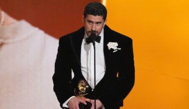 Bad Bunny accepting one of his Grammys. Pic: AP/Chris Pizzello