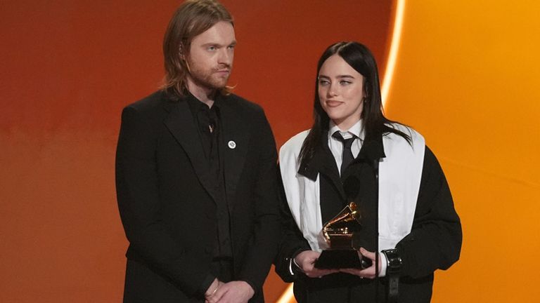 Finneas, left, and Billie Eilish accept the award for song of the year for Wildflower at the Grammys in. Pic: AP/Chris Pizzello