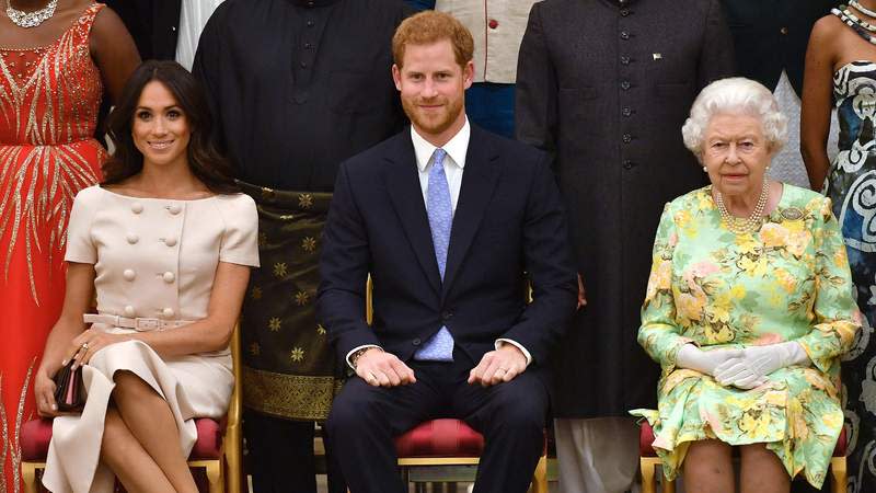 Meghan Markle, Prince Harry and Queen Elizabeth II attend the Young Leaders Awards Ceremony in 2018. By: MEGA
