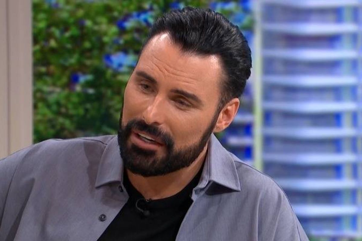 Rylan Clark wearing a grey shirt and black t-shirt