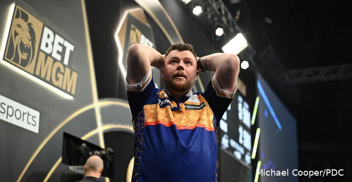 Josh Rock cannot believe he has just hit a nine-darter