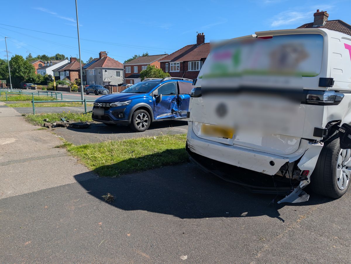A van and car damaged in an early morning crash