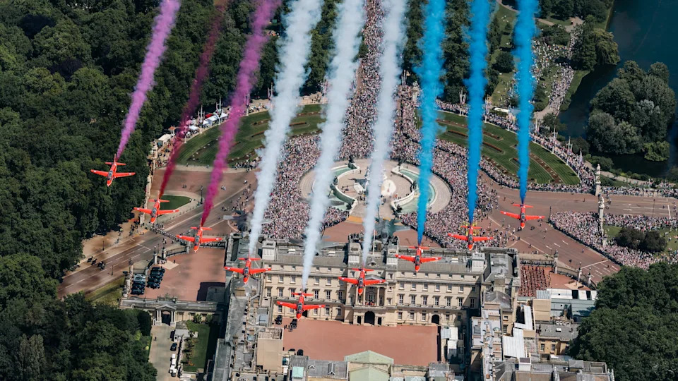 The iconic Red Arrows carry out a flypast over Buckingham Palace following the Trooping the Colour ceremony.<span> Credit: MoD/PA</span>