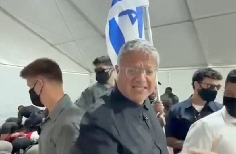 Israeli National Security Minister Itamar Ben Gvir reacts as flotilla activists are detained by Israeli forces, in Ashdod Port, Israel, in this screen grab taken from a video released on May 20, 2026.