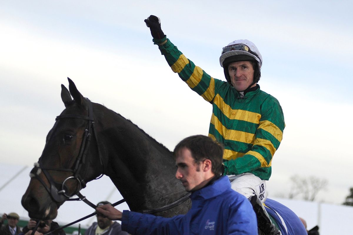 Sir AP McCoy celebrates his 4,000th winner at Towcester in 2013