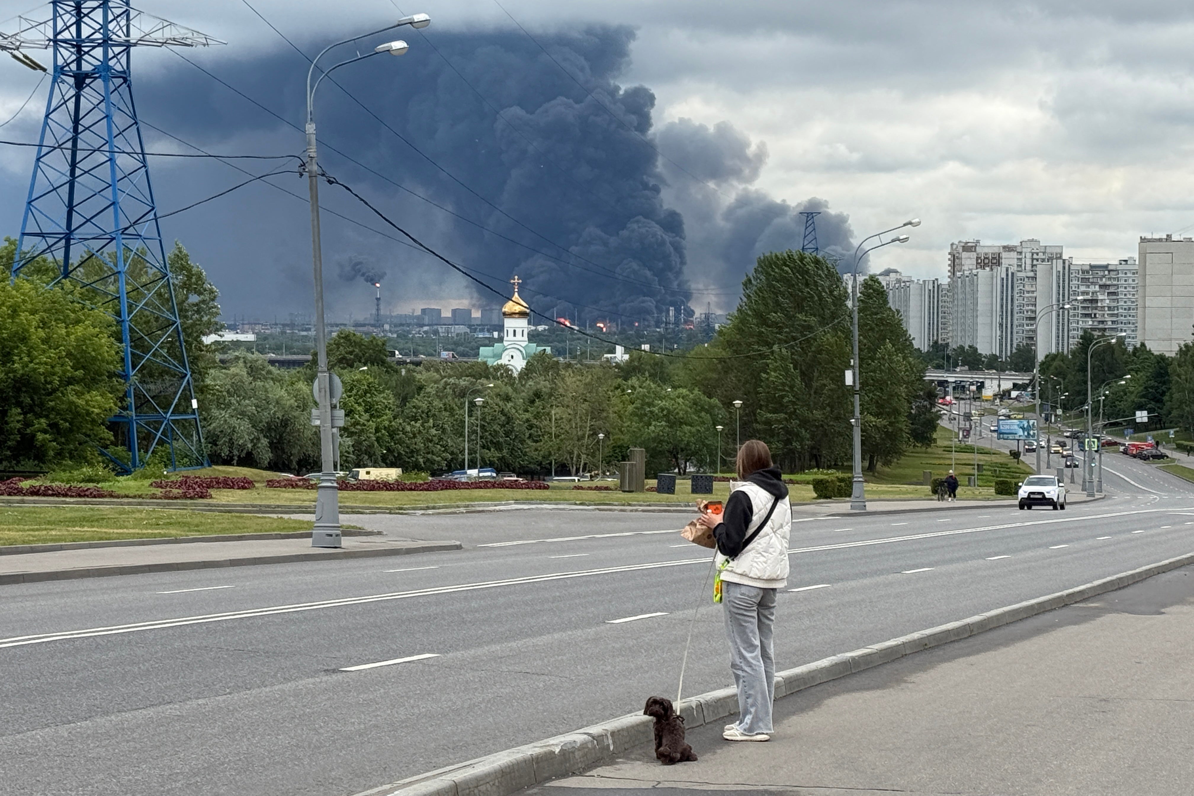 Black smoke rises from the area of the Russian oil producer Gazprom Neft's Moscow oil refinery.