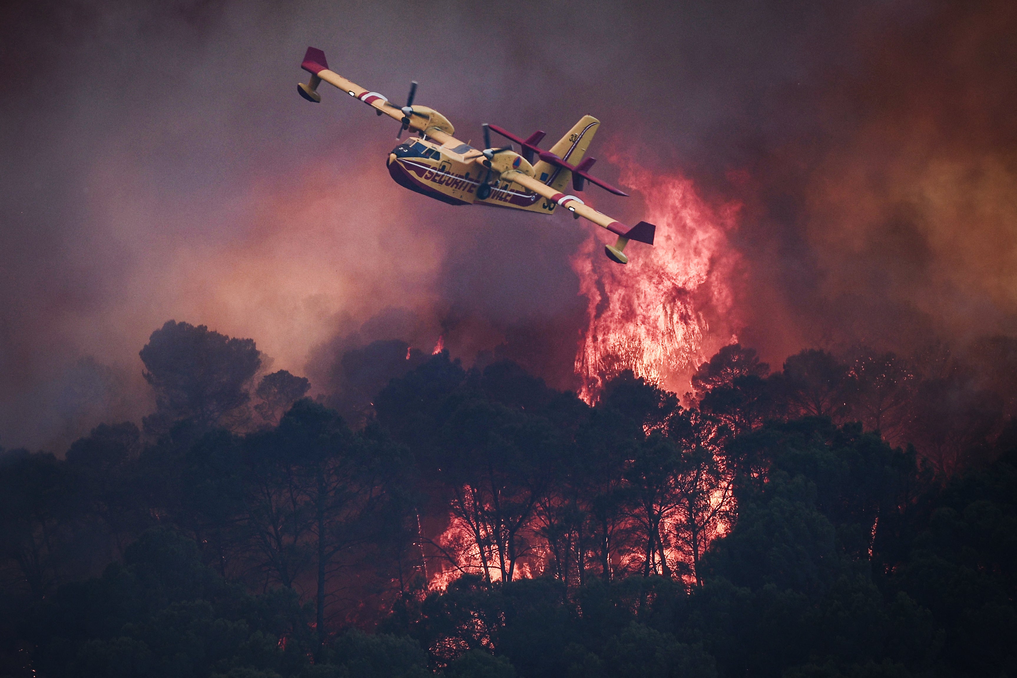 Vast flames engulfed France’s southeastern forests near Contignac
