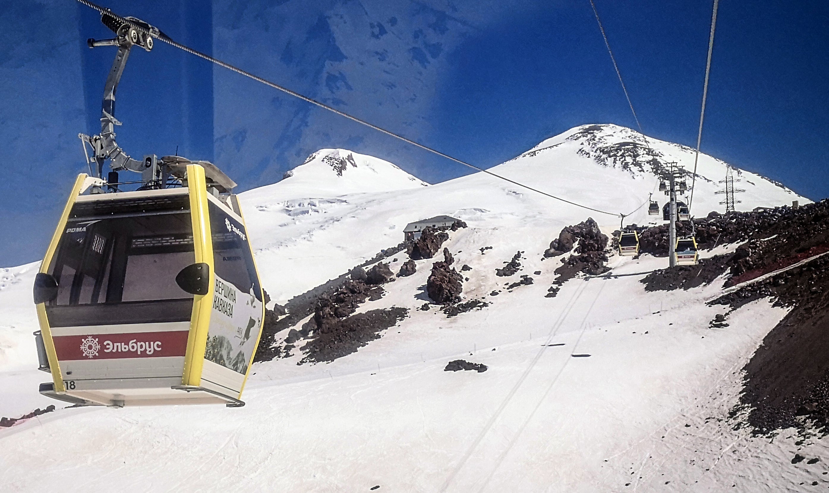 A cable car running above the slopes of Mount Elbrus near Terskol, Russia's Kabardino-Balkarian Republic