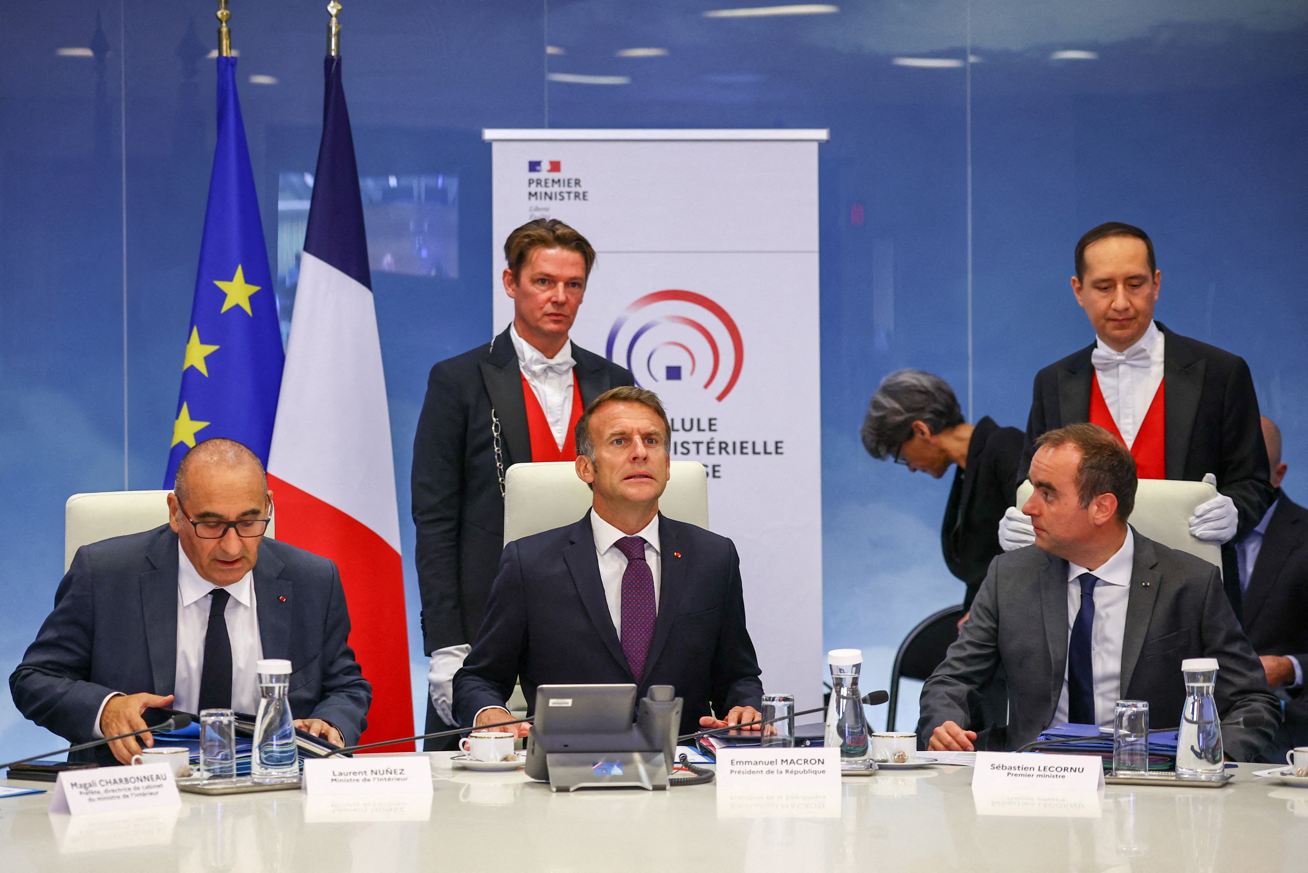 France's President Emmanuel Macron (C), France's Prime Minister Sebastien Lecornu (R), France's Interior Minister Laurent Nunez (L) attend a meeting with other members of the cabinet to discuss wildfires in the country, at the Hotel de Beauvau, the French Interior Ministry, in Paris on July 27, 2026.