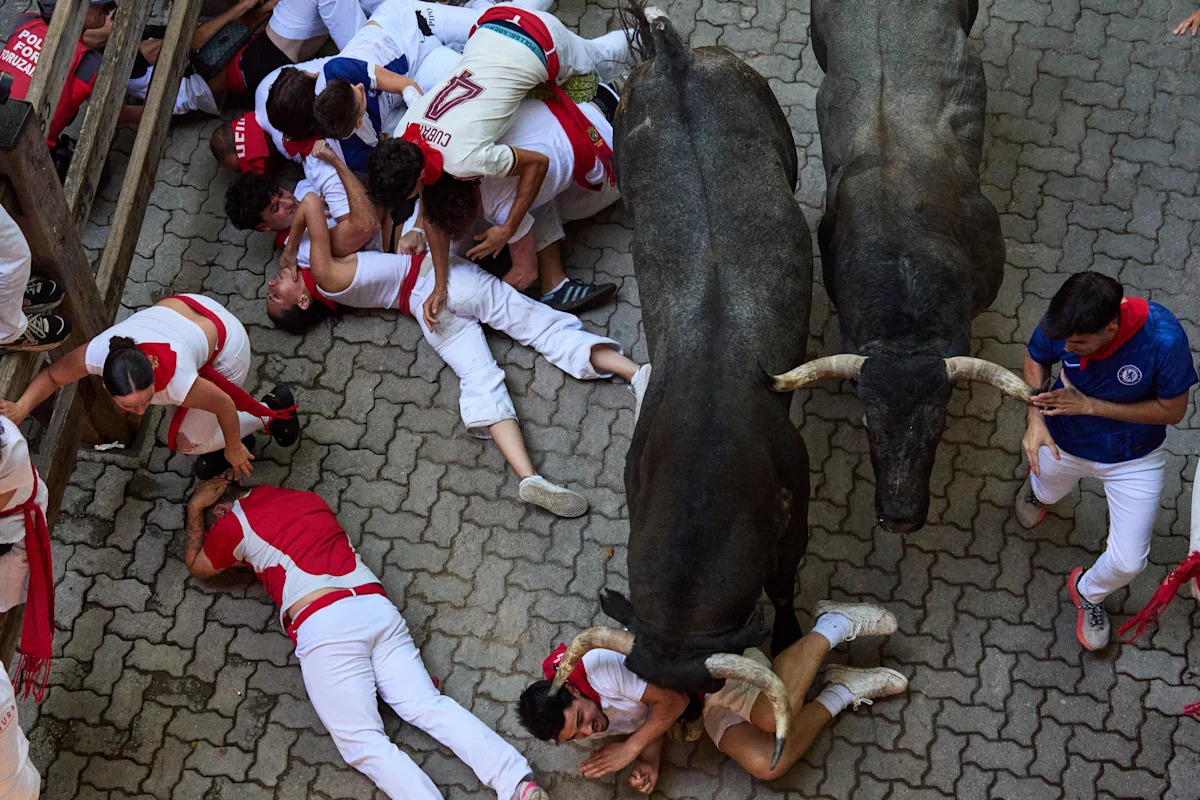 Bull gores runner in the face at Spain's San Fermin bull run festival