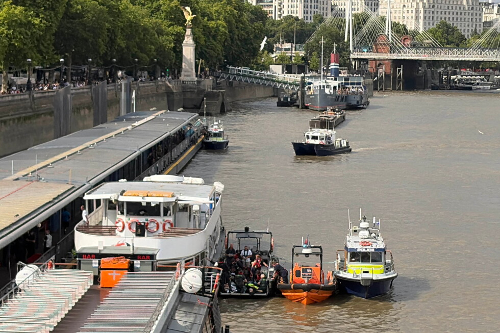 Police boat crashes into central London bridge and sends officers into Thames