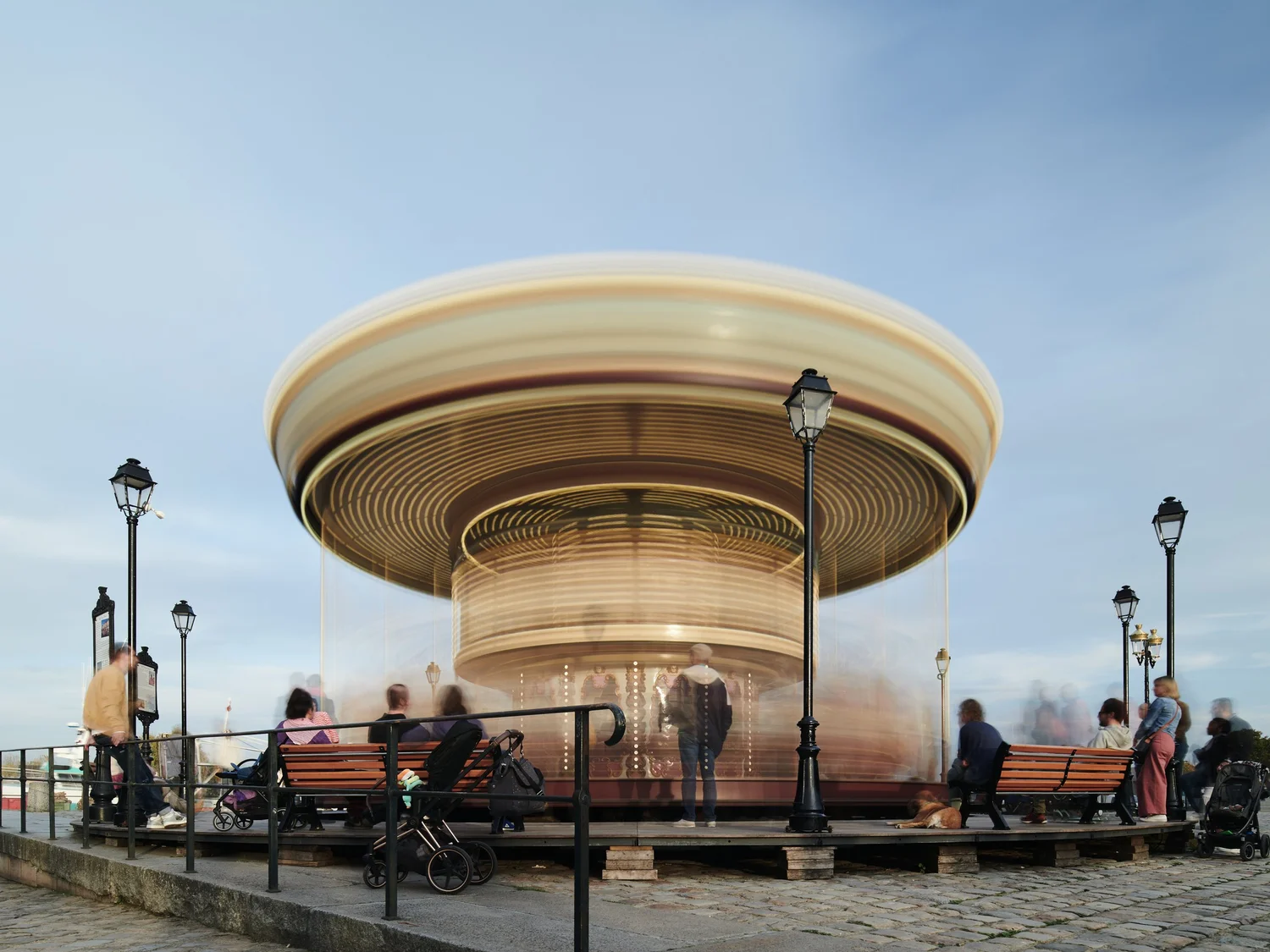 a long-exposure photo of a spinning carousel