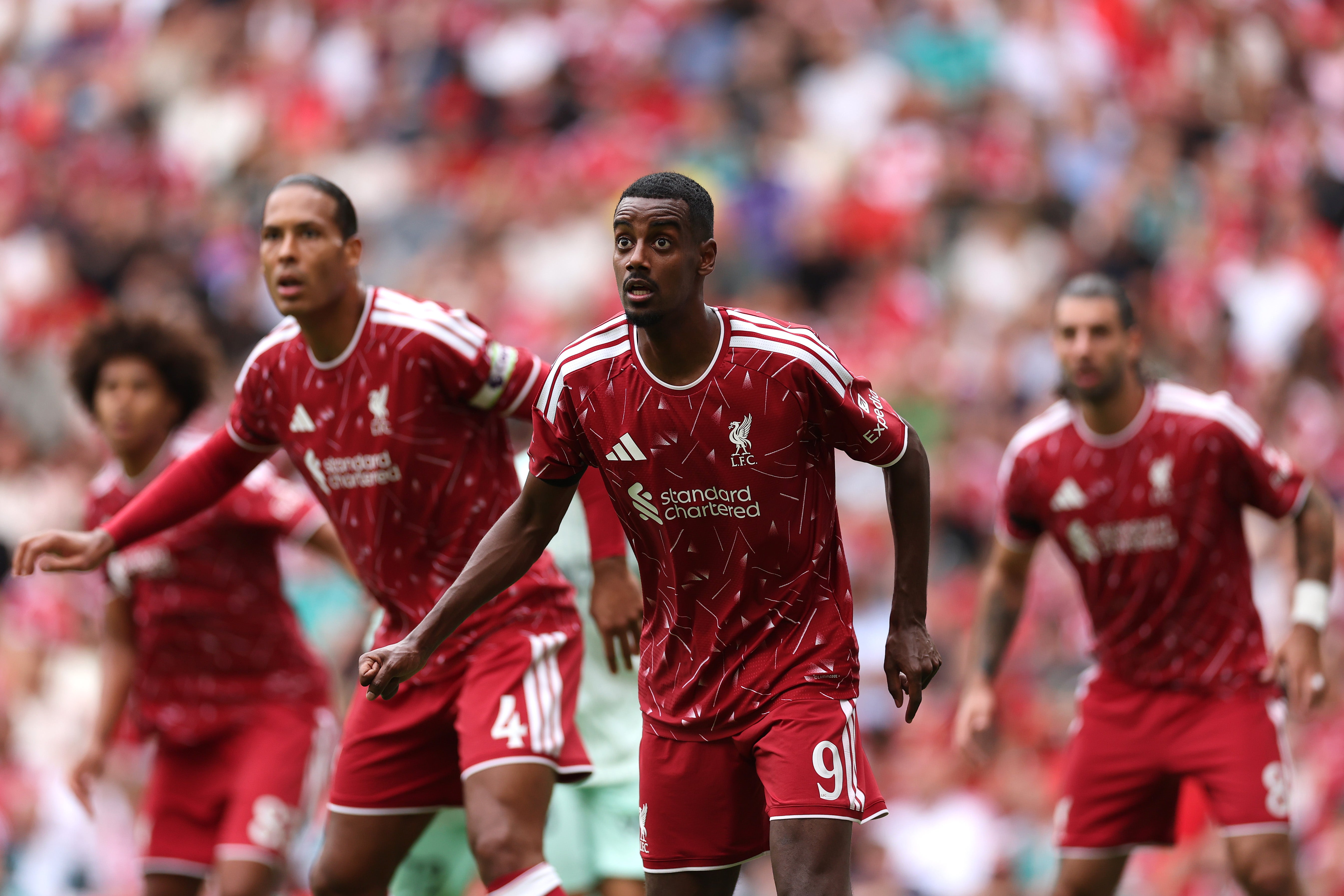 Van Dijk (left) made his preseason bow for Liverpool against Monaco over the weekend