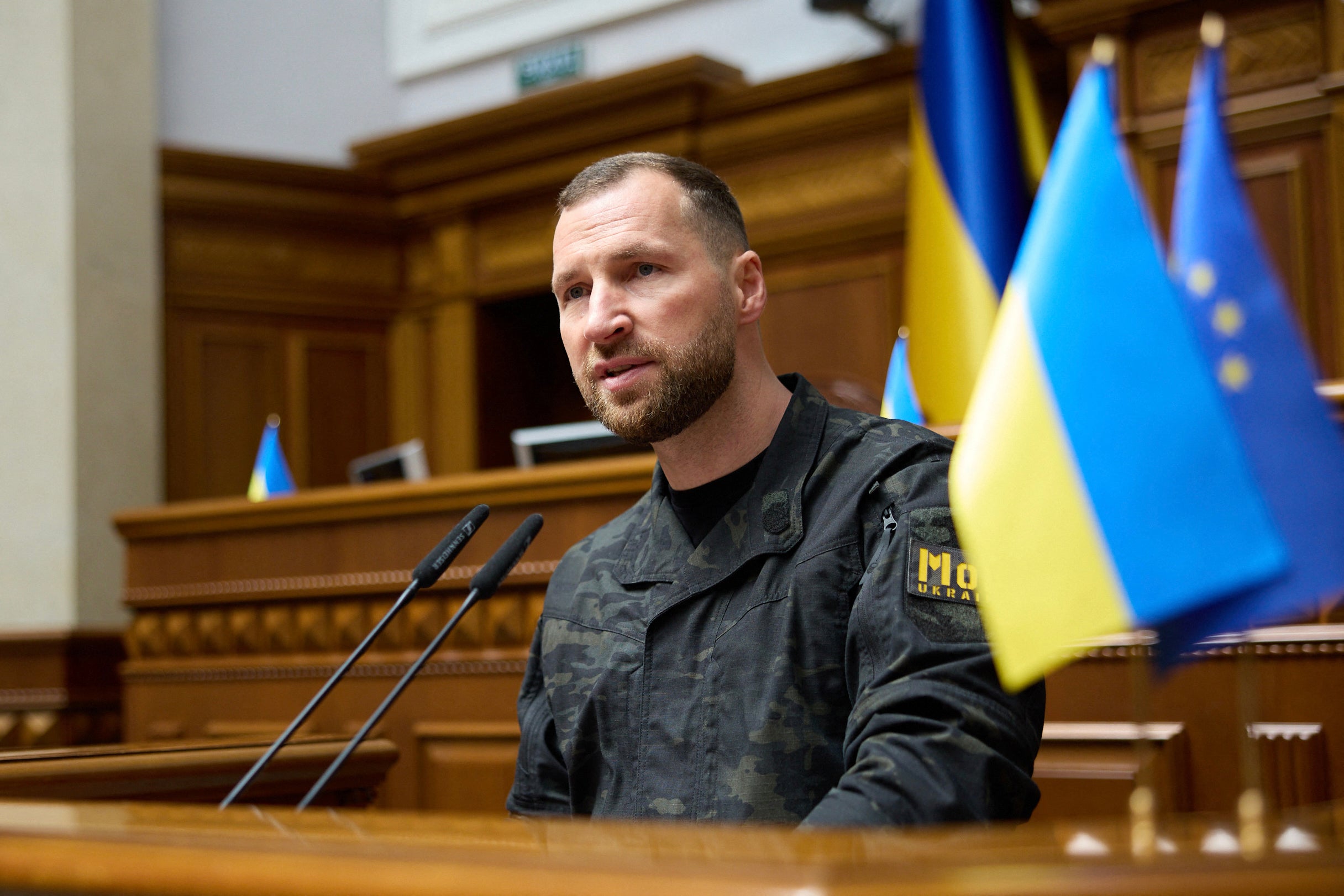 Acting Ukraine's Defence Minister Yevgeniy Khmara addresses members of the Ukrainian parliament before they vote to elect Ukraine's new defence minister in Kyiv on August 19, 2026, amid the Russian invasion of Ukraine.