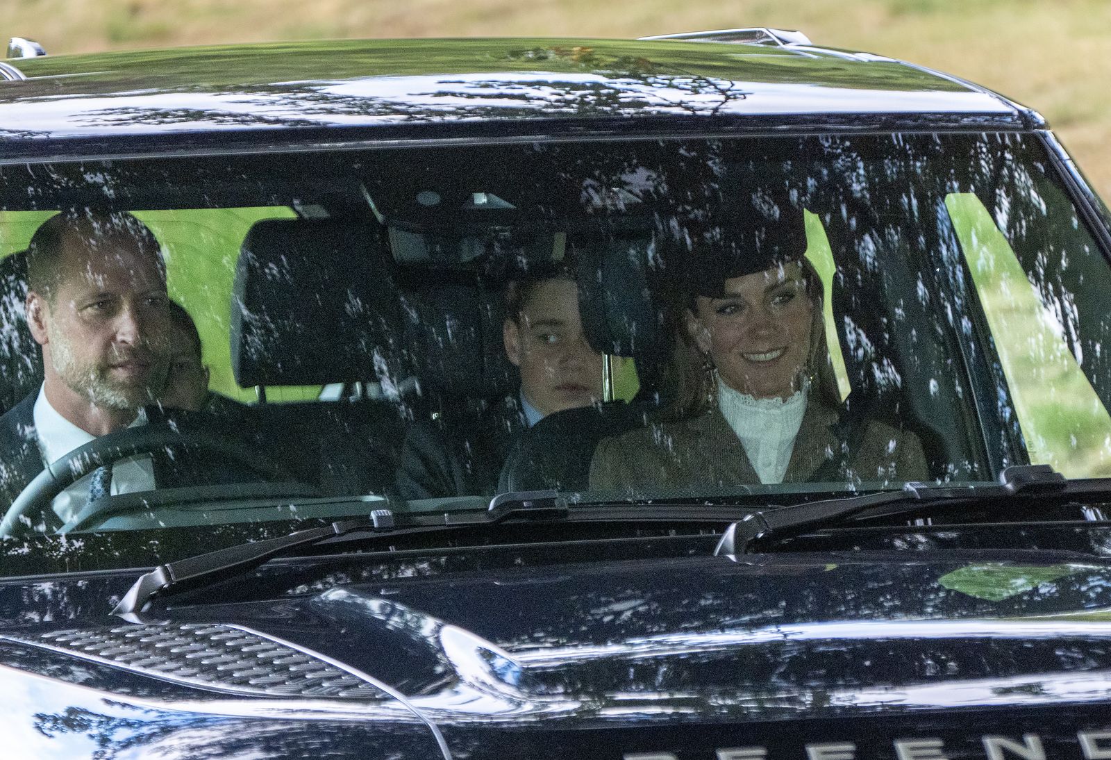 Image may contain Prince George of Cambridge Car Transportation Vehicle Adult Person Wedding Face and Head