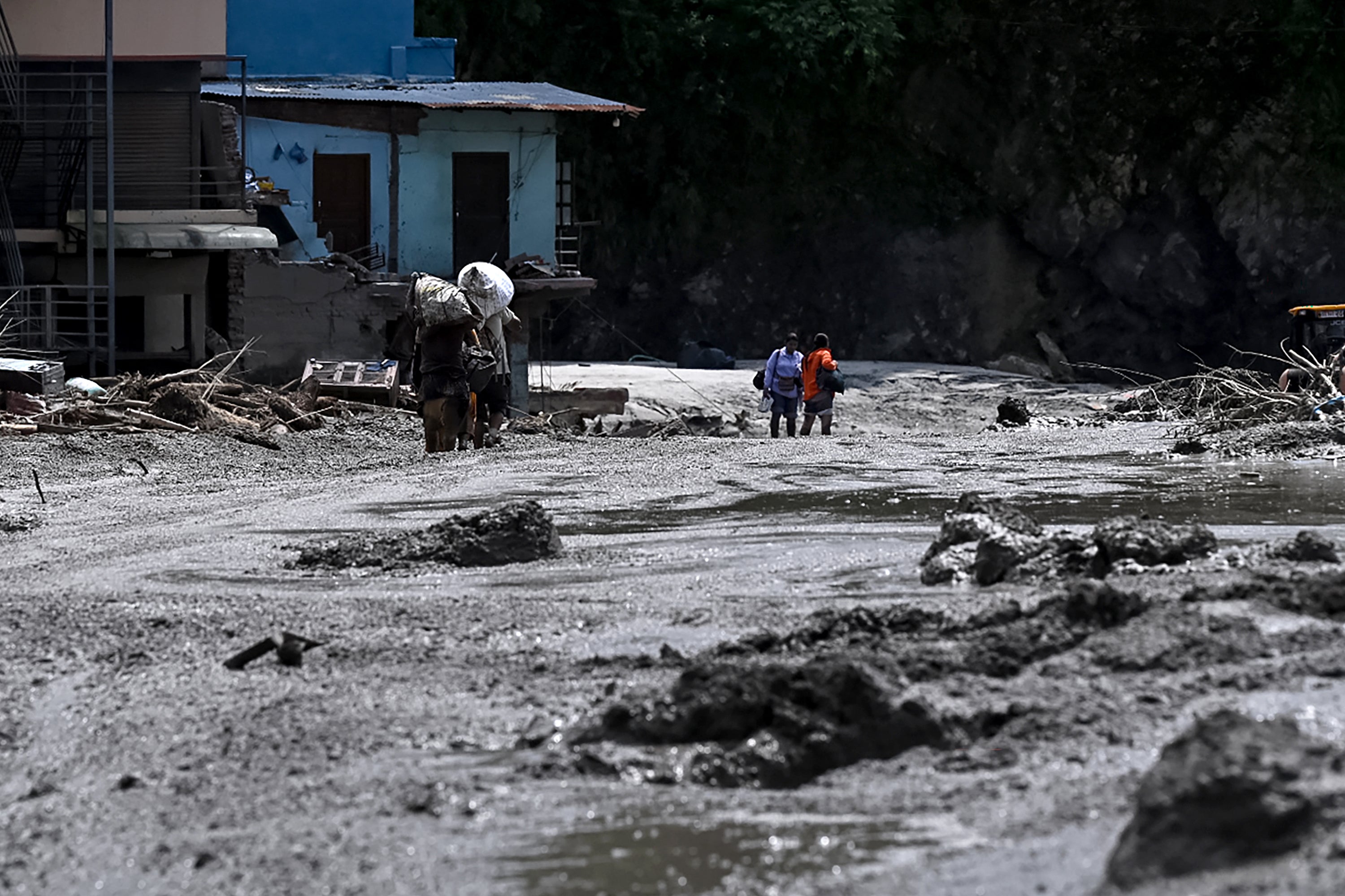 Rescue efforts continue after flooding in the Rasuwa district of Nepal