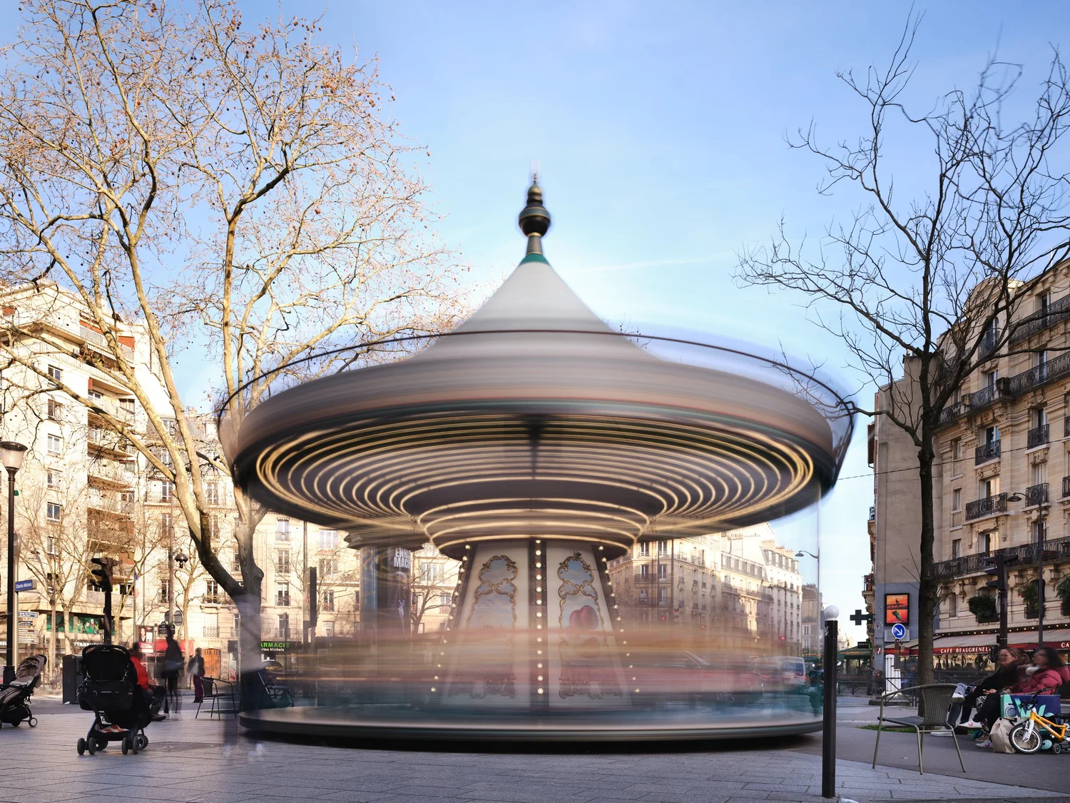 a long-exposure photo of a spinning carousel