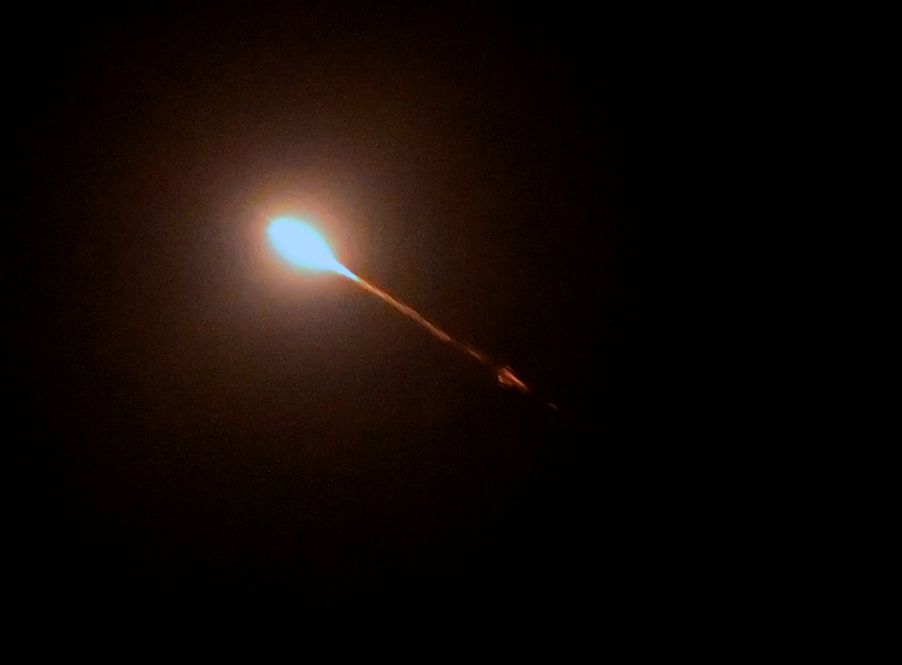 A flying missile seen during a Russian aerial attack in Kyiv