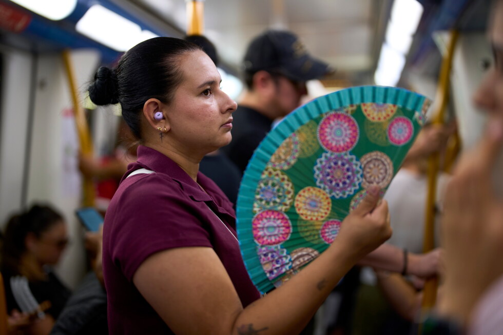 Spanish folding hand fans are everywhere thanks to summer heat waves