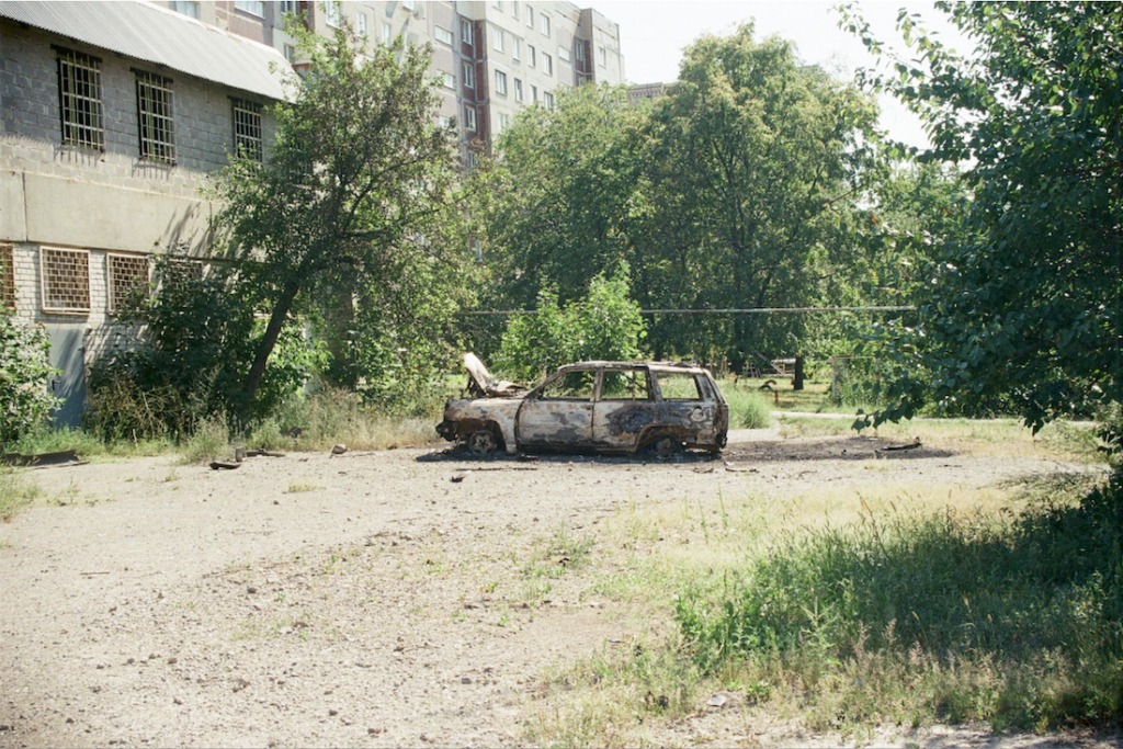 A car burned out by a Russian drone. Kramatorsk, August 2026. Yulia Kalaban for JAMnews.