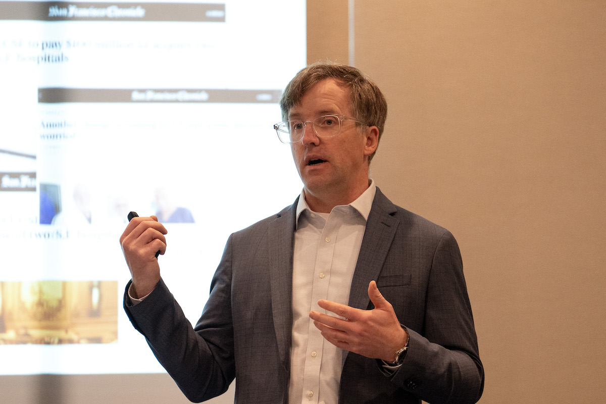 Kristof Stremikis with the California Health Care Foundation speaks during the HJ25 session "How hospital mergers harm local communities"
